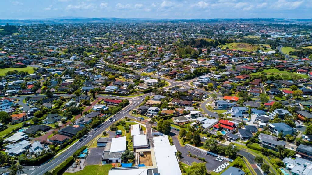 Aerial view on residential suburbs on a sunny day. Auckland, New Zealand.